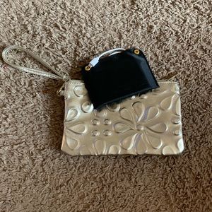 Gold wristlet with phone charger. OBO